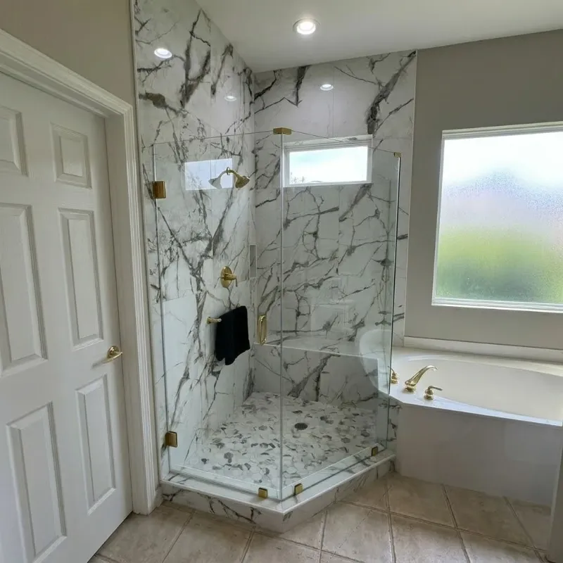 Bathroom walls after new tile work by Paez And More